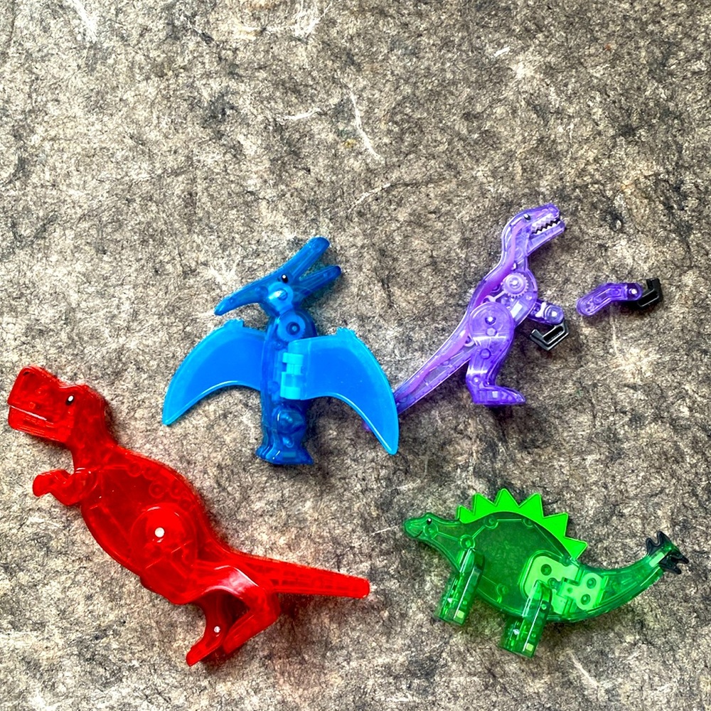 Four Magnatiles dinousars